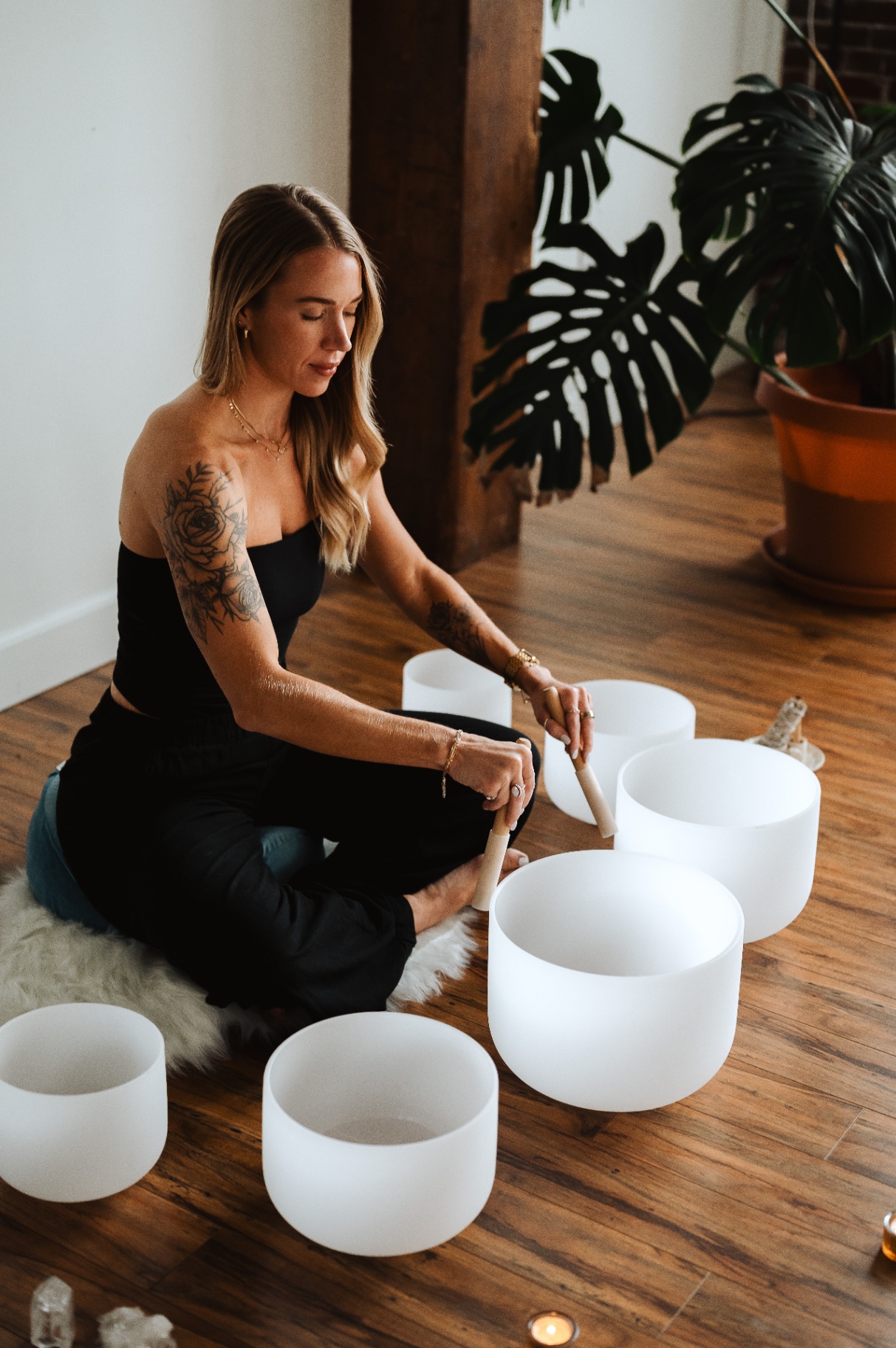Kelli Blake playing crystal singing bowls